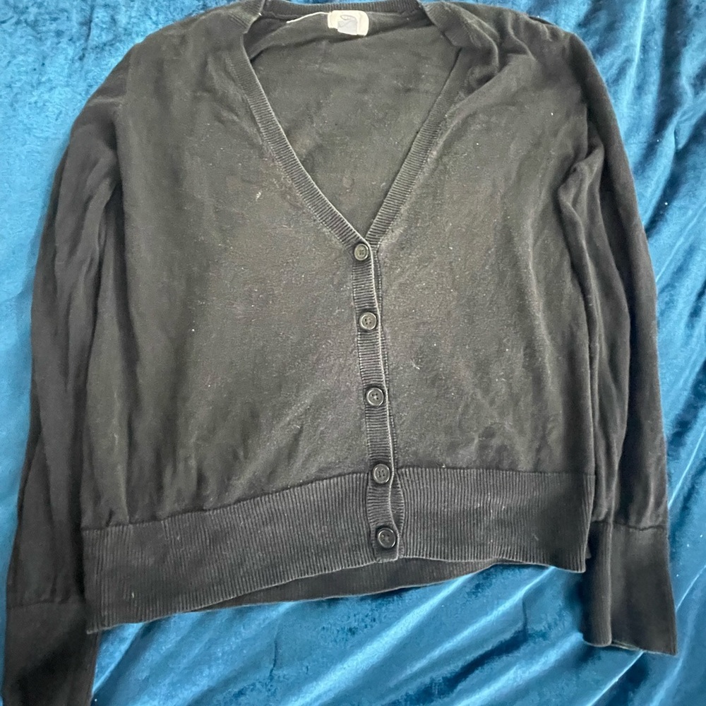 black buttoned up top
